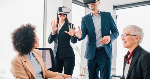 Business people wearing 3D glasses at their place of work