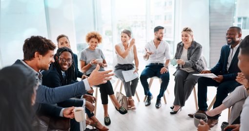 Shot of a group of businesspeople having a discussion in an office